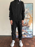 Survêtement Nike x NOCTA Northstar Nylon – Ensemble Veste & Pantalon